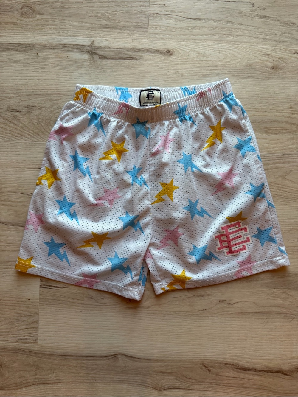 Eric Emanuel White Athletic Shorts with Blue, Pink & Yellow Stars